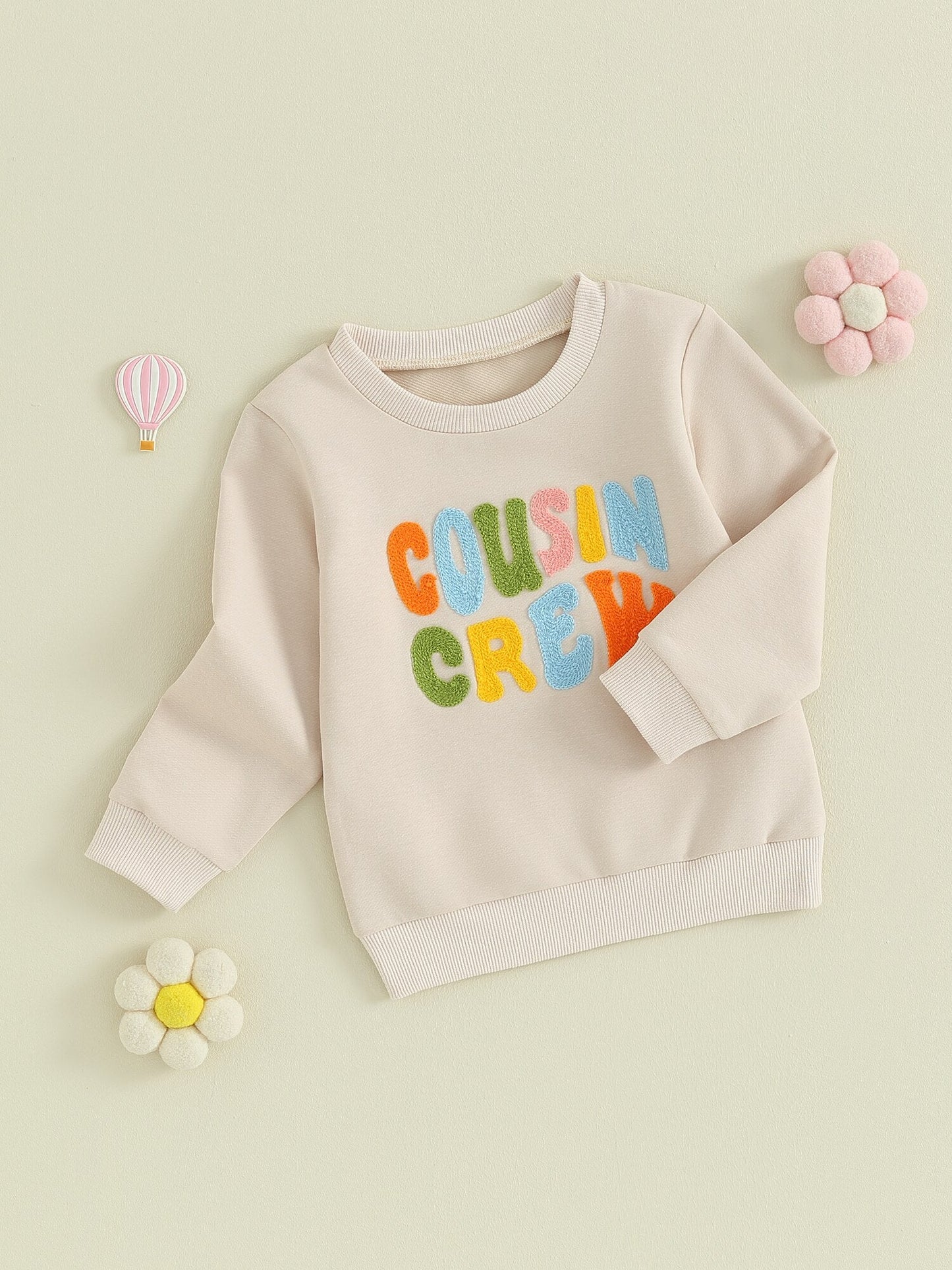 Toddler boys and girls fuzzy letter embroidery crew neck long sleeve pullover by August + Willow, casual and cozy outfit.