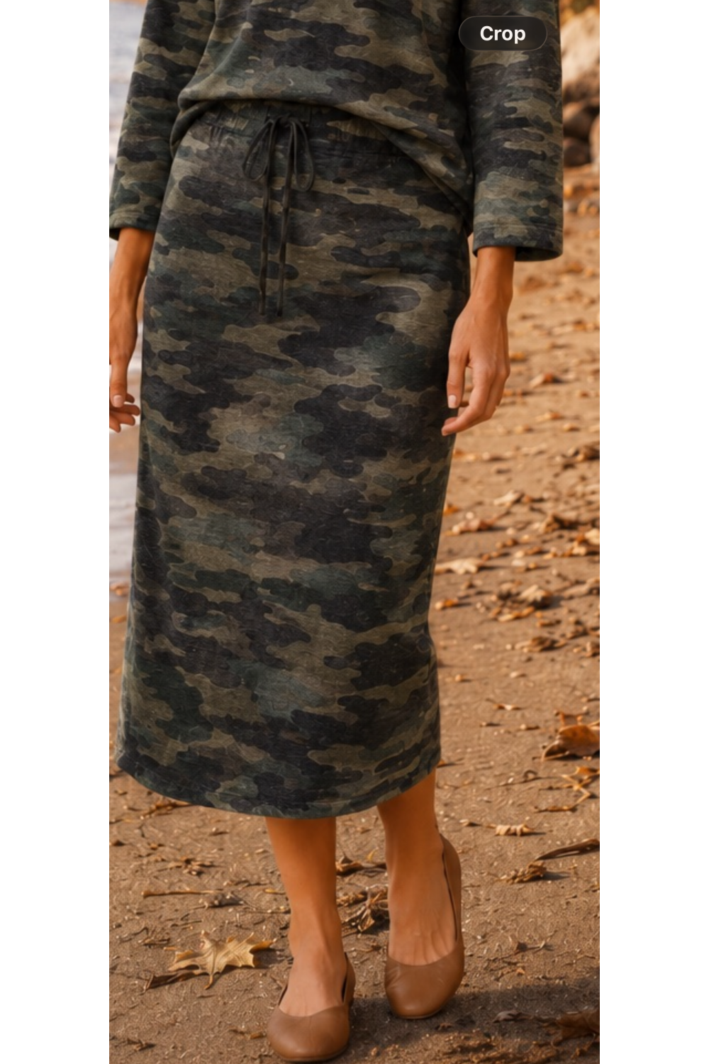 Close-up of camouflage straight midi skirt with drawstring waist