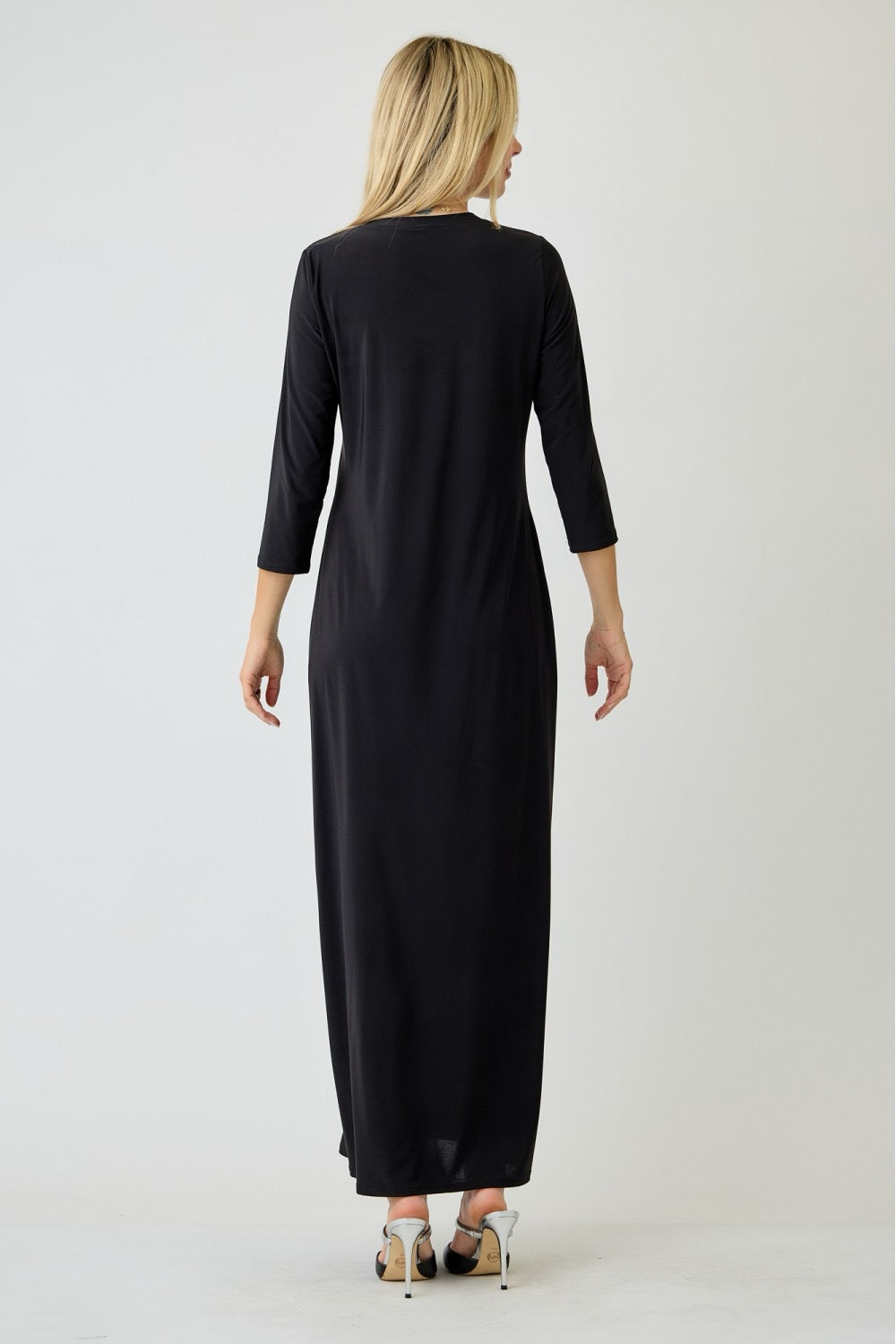 Ladies long sleeve plus layering maxi dress in classic black by Celeste Clothing, shown on a model with a flowing design.