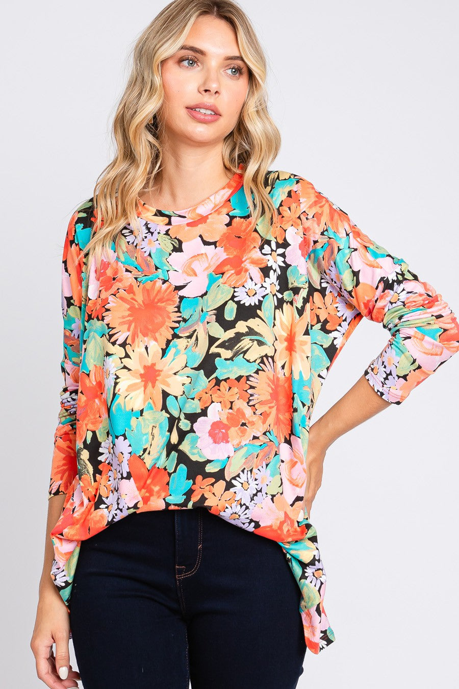 Cream N Sugar floral print loose fit long sleeve top with relaxed fit and vibrant floral pattern, perfect for casual wear.