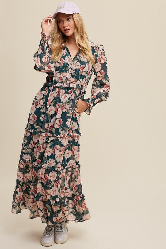 Hunter green floral maxi dress from Listicle featuring V-neck, ruffled tiers, and a flowing silhouette.