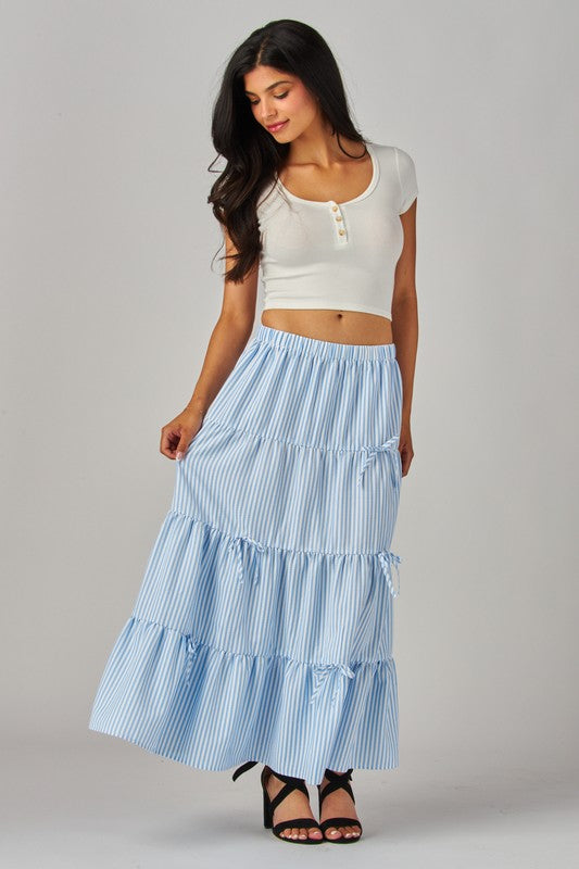 Blue Love Poem maxi skirt with stripes and bows, flowing design, made of lightweight fabric, perfect for casual or dressy wear.
