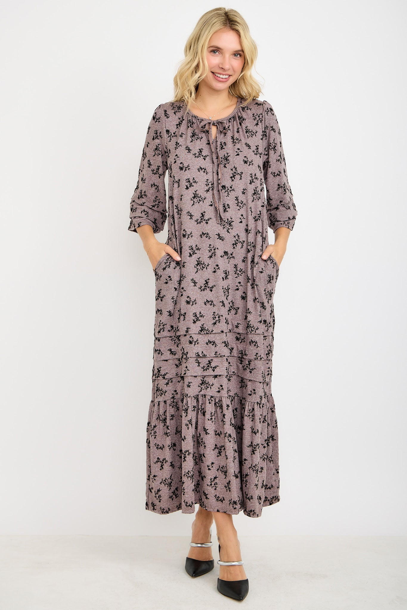 Beige textured pin tuck maxi dress with pockets from Modest and Devoted Designs, shown with colorful variants in a casual setting.