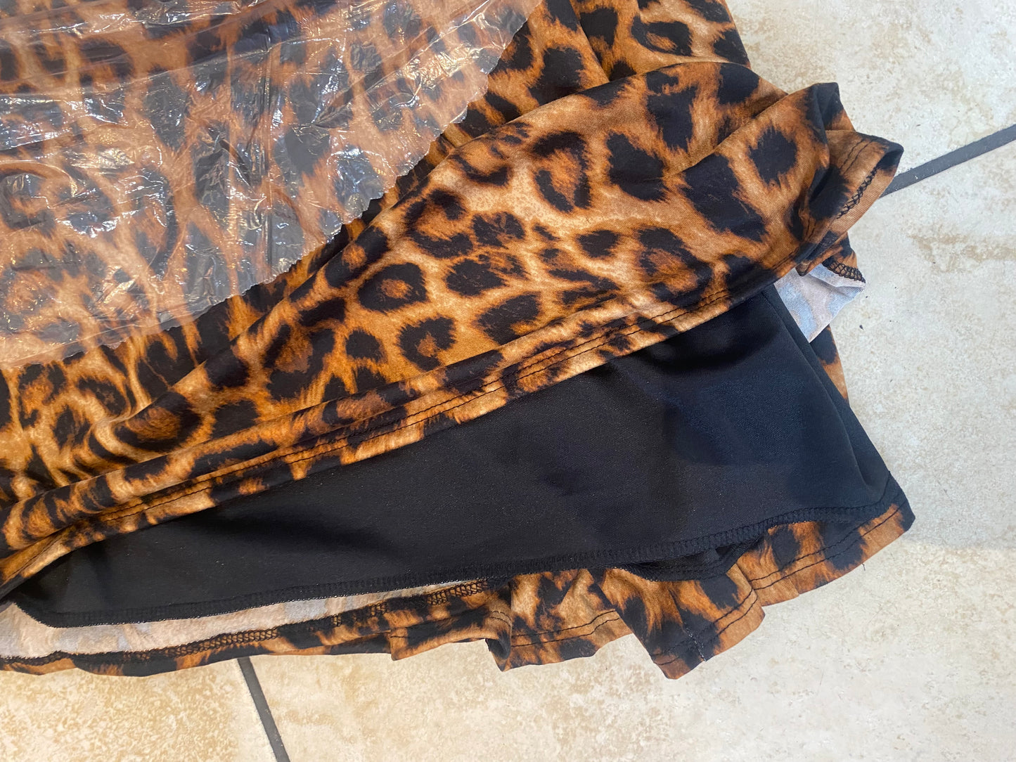 Leopard print fully lined elastic waist pencil skirt from Modest and Devoted Designs, stylish and fitted for elegant look.