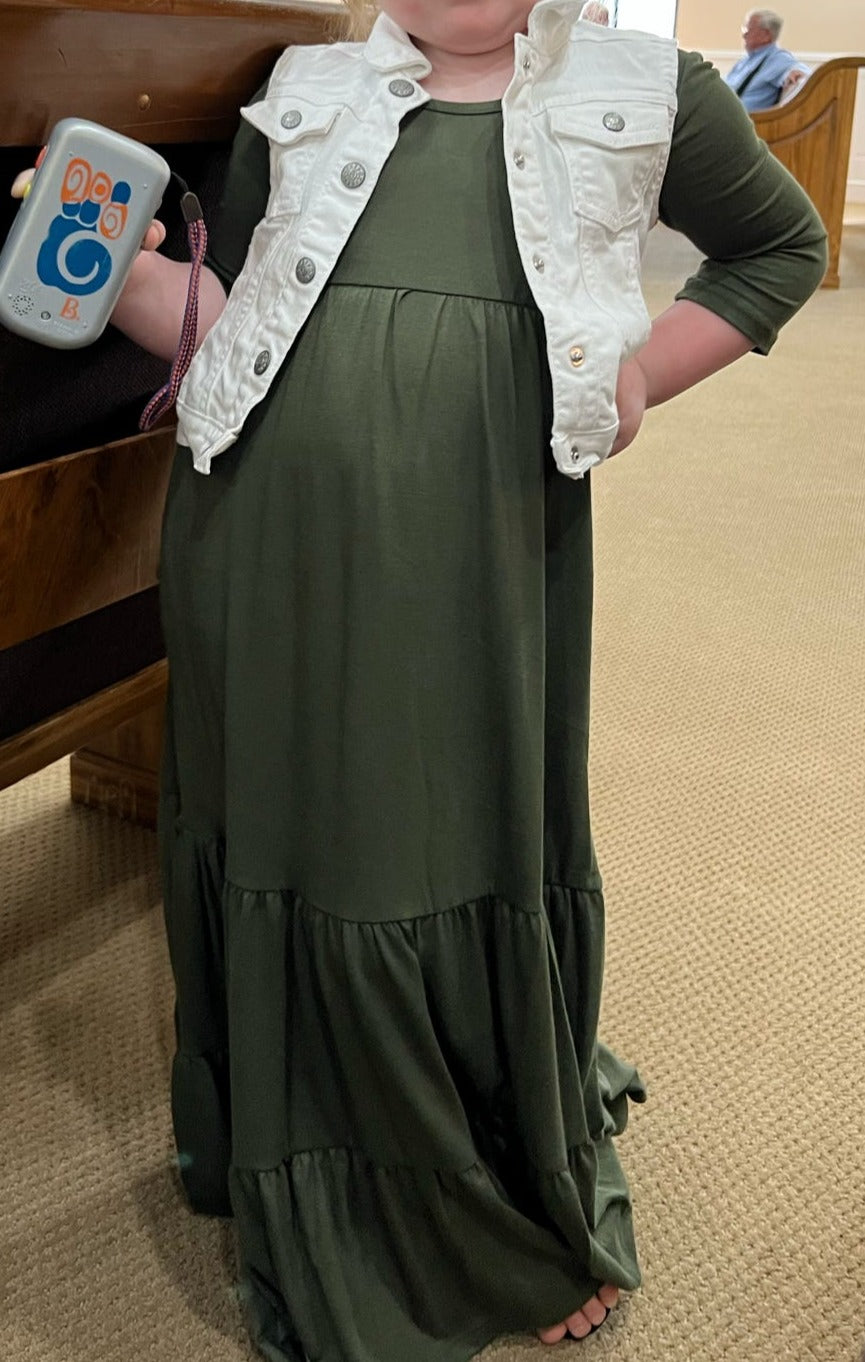 Green girls solid tiered maxi dress by ModestAndDevoted, featuring a flowing, layered design perfect for young girls.