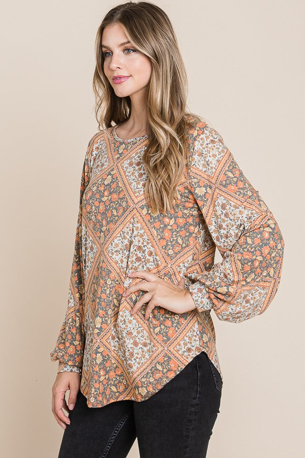 ModestAndDevoted Bombom long sleeve Jacquard boho top in rust and cream, featuring intricate woven patterns and a relaxed fit.
