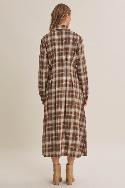 Mocha plaid cotton shirt dress by ModestAndDevoted with a classic button-down collar and long sleeves, styled for casual wear.