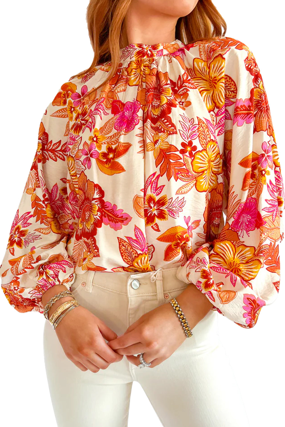 Orange floral print blouse by ModestAndDevoted with pearl buttons, keyhole neckline, long puff sleeves, made of viscose and polyamide.