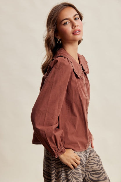 Listicle contrast stitch Peter Pan collar long sleeve blouse in terracotta featuring a classic design and detailed stitching.