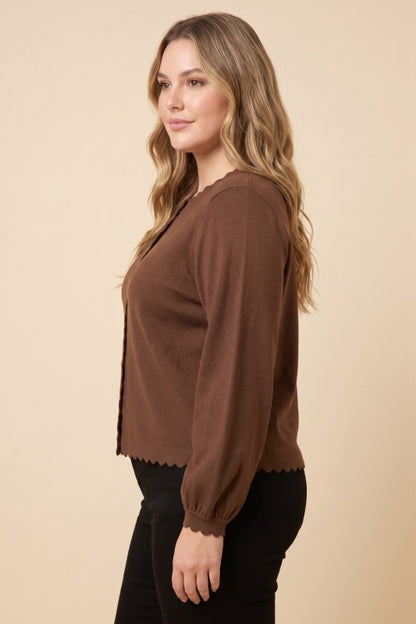 Plus scallop edge balloon sleeve sweater cardigan by ModestAndDevoted, featuring a cozy knit with elegant scalloped details.