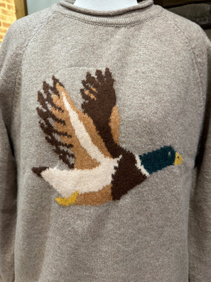 Closeup of knitted flying mallard graphic