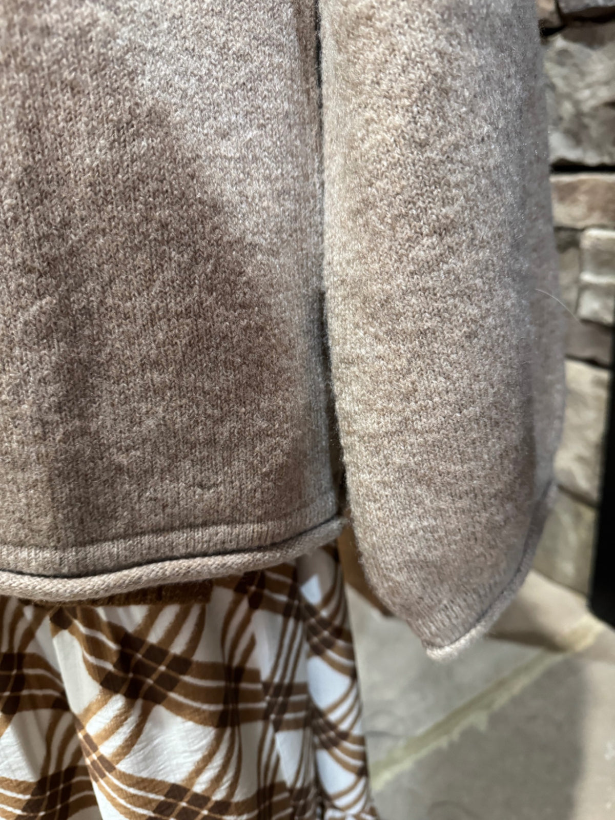 Sleeve and rolled hem detail