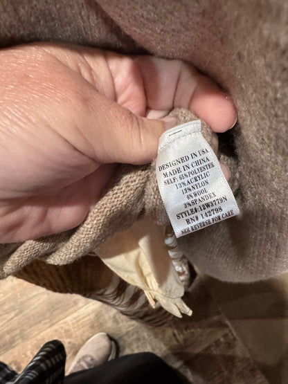 Back view of solid taupe mallard sweater