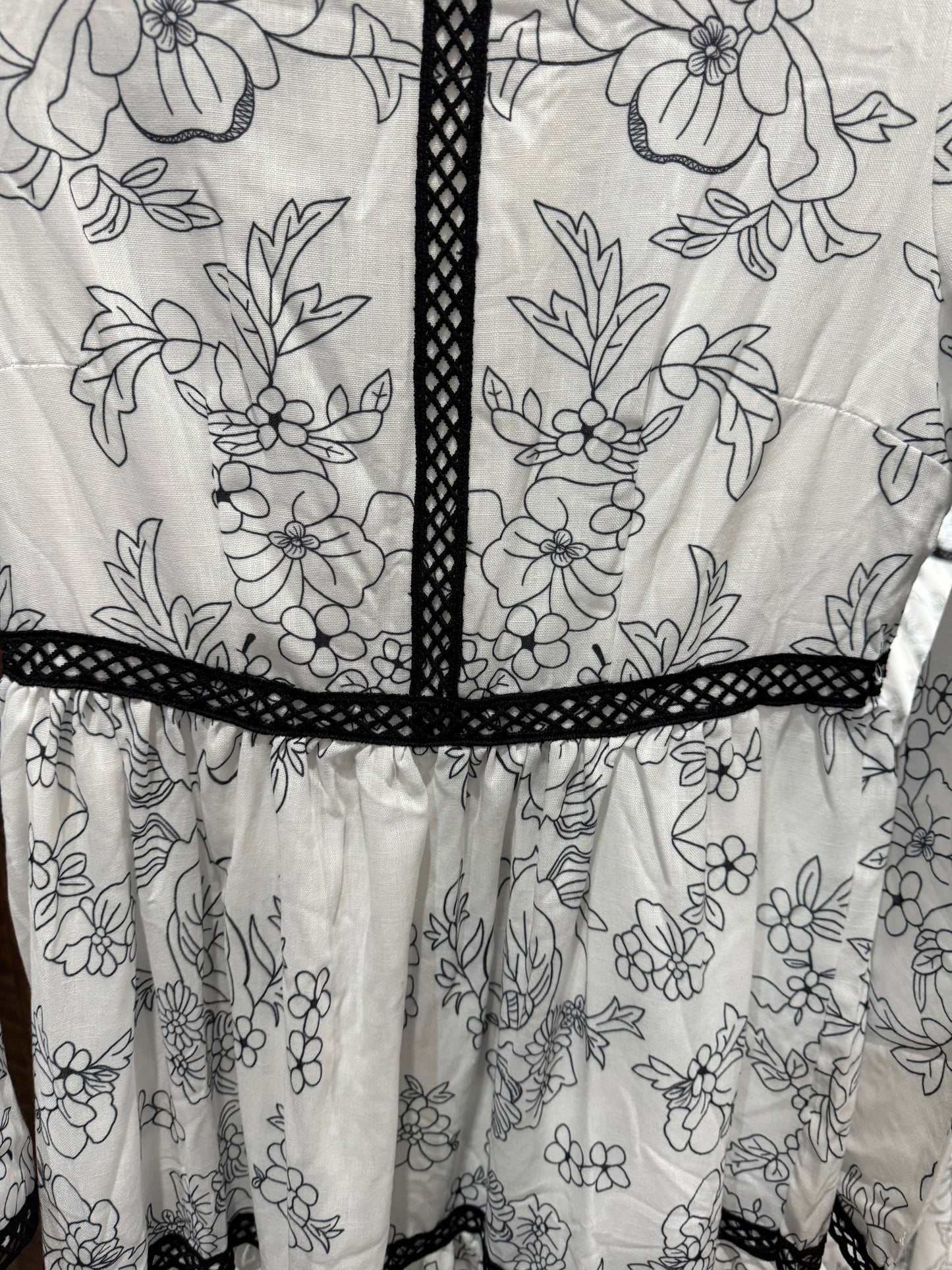 Catch Desire white and black floral maxi dress with bell sleeves and coordinating white slip