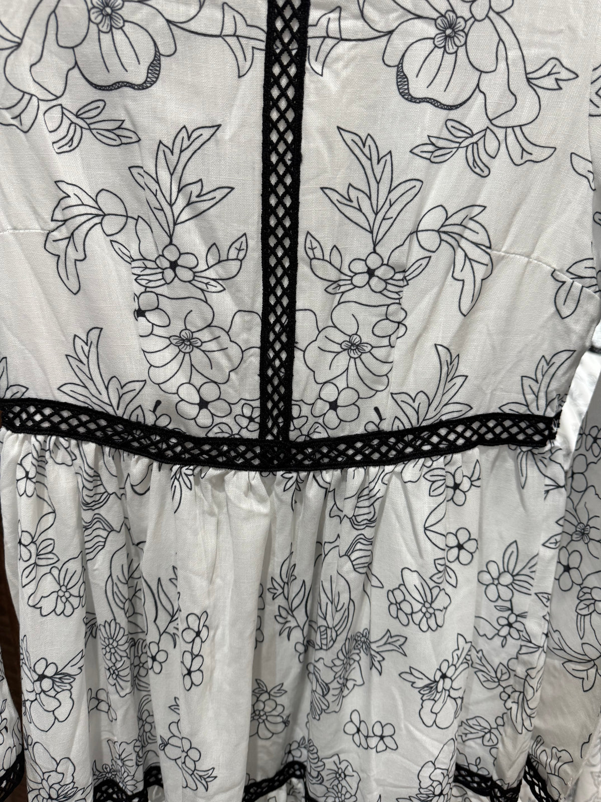 Catch Desire white and black floral maxi dress with bell sleeves and coordinating white slip