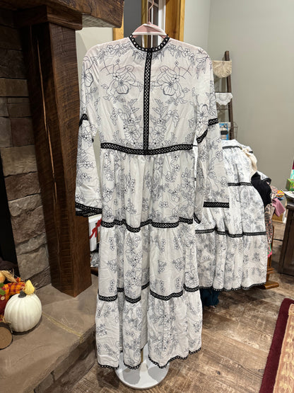 Catch Desire white and black floral maxi dress with bell sleeves and coordinating white slip