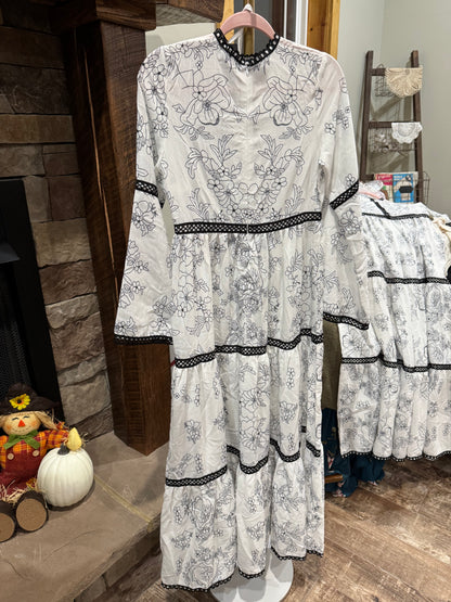 Catch Desire white and black floral maxi dress with bell sleeves and coordinating white slip