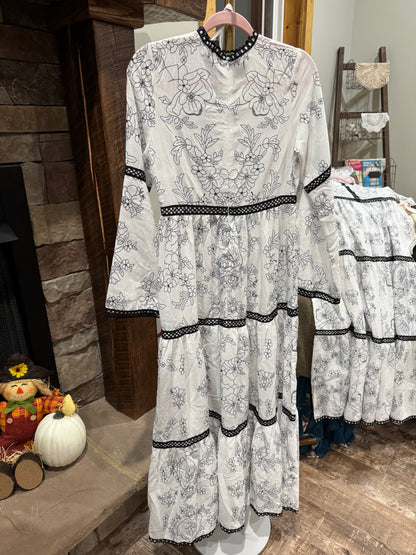 Catch Desire white and black floral maxi dress with bell sleeves and coordinating white slip