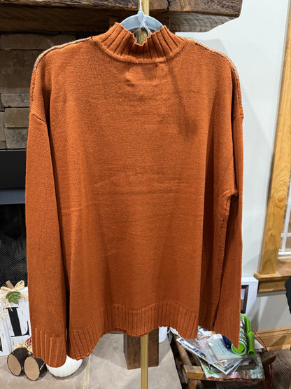 Solid rust knit sweater back
