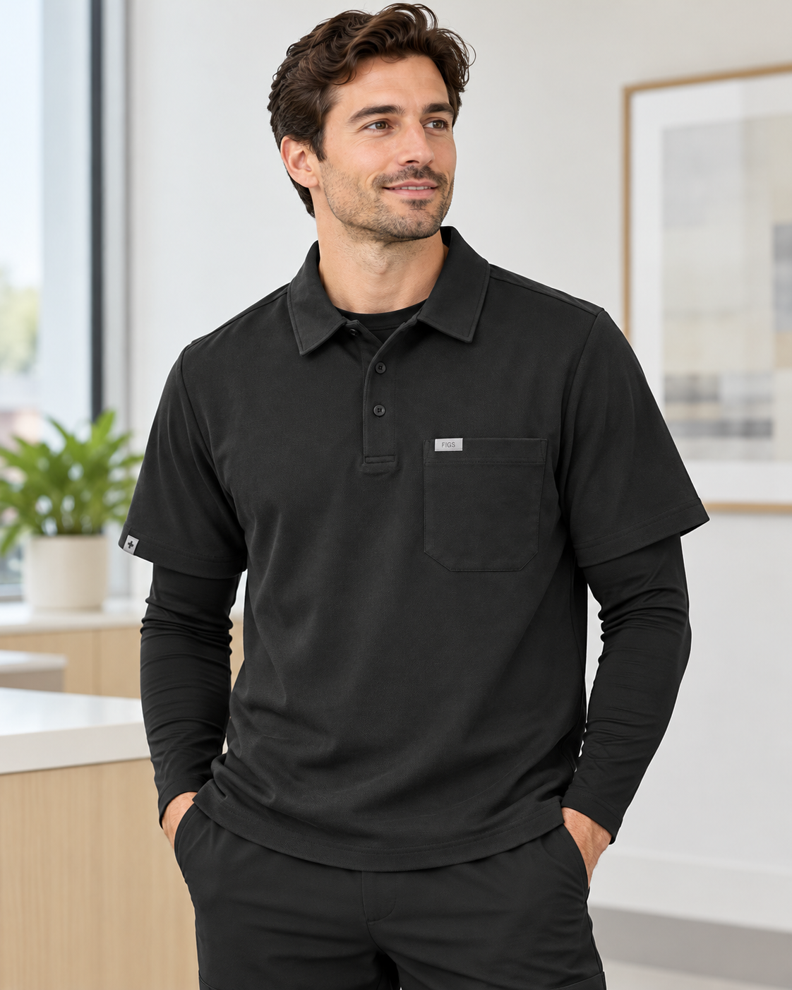 FIGSPRO men's black short sleeve technical pique scrub polo styled with black underlayer