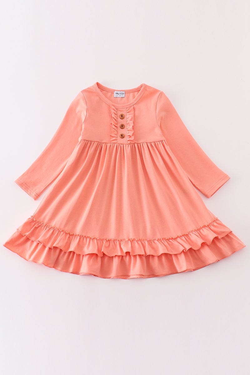 Girls orange ruffle dress with long sleeves by Abby & Evie, perfect for 12-month-old girls, featuring a sweet and stylish design.