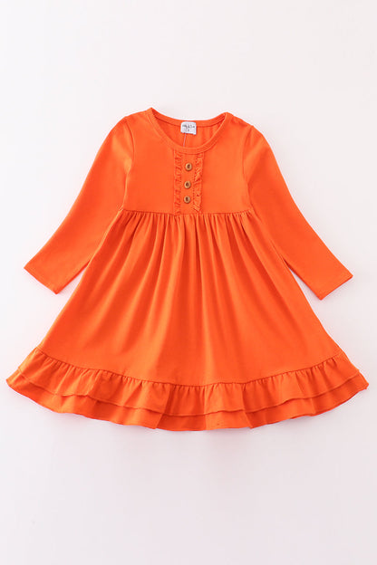 Orange girls' ruffle dress with long sleeves by Abby & Evie, perfect for 12-month-old girls, featuring charming ruffle details.