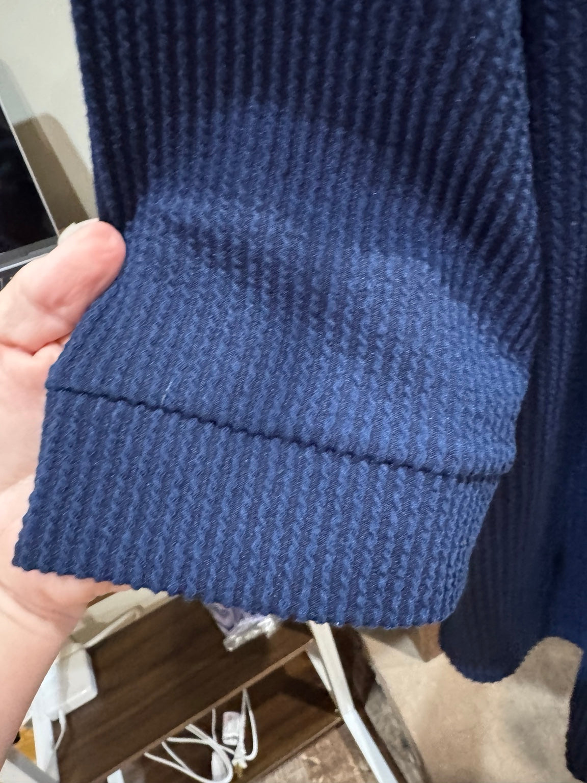 Andree navy ribbed three-quarter sleeve cuff detail