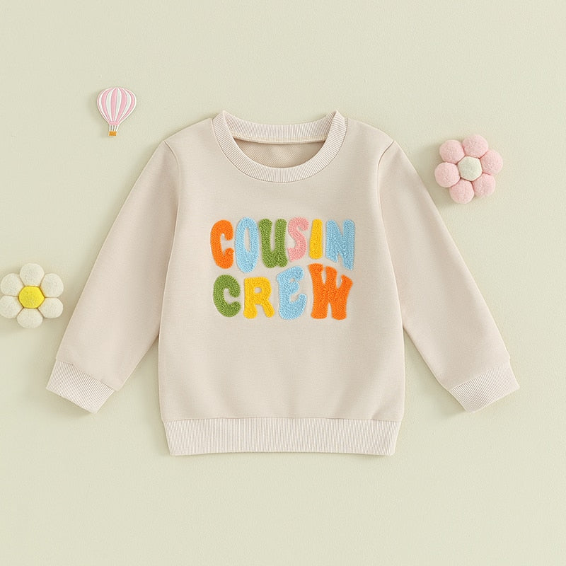 Baby and toddler fuzzy letter embroidery crew neck pullover in long sleeves, suitable for boys and girls, by August + Willow.