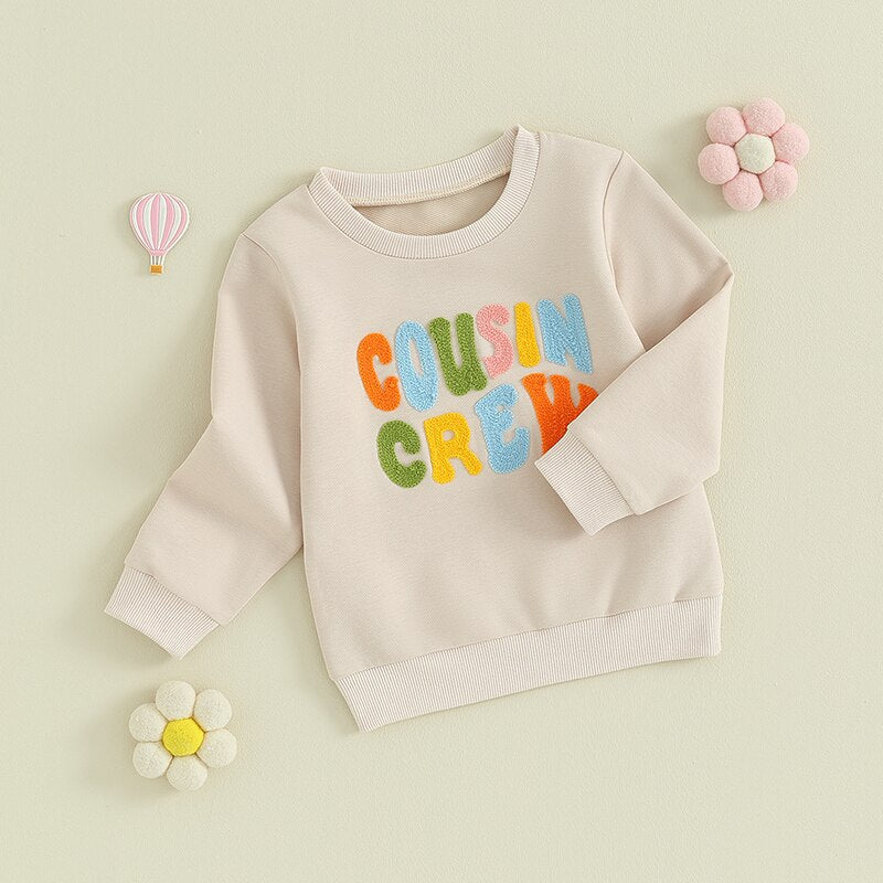 Baby toddler fuzzy letter embroidery cousin crew neck pullover by August + Willow, long sleeve, round neck, loose fit for kids.