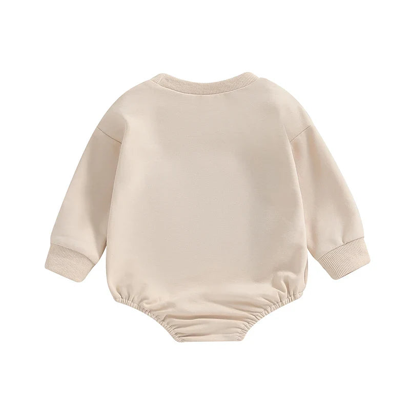 Baby girls and boys Little Bean bodysuit by August + Willow, long sleeve casual romper with letter embroidery, beige, 12-18 months.