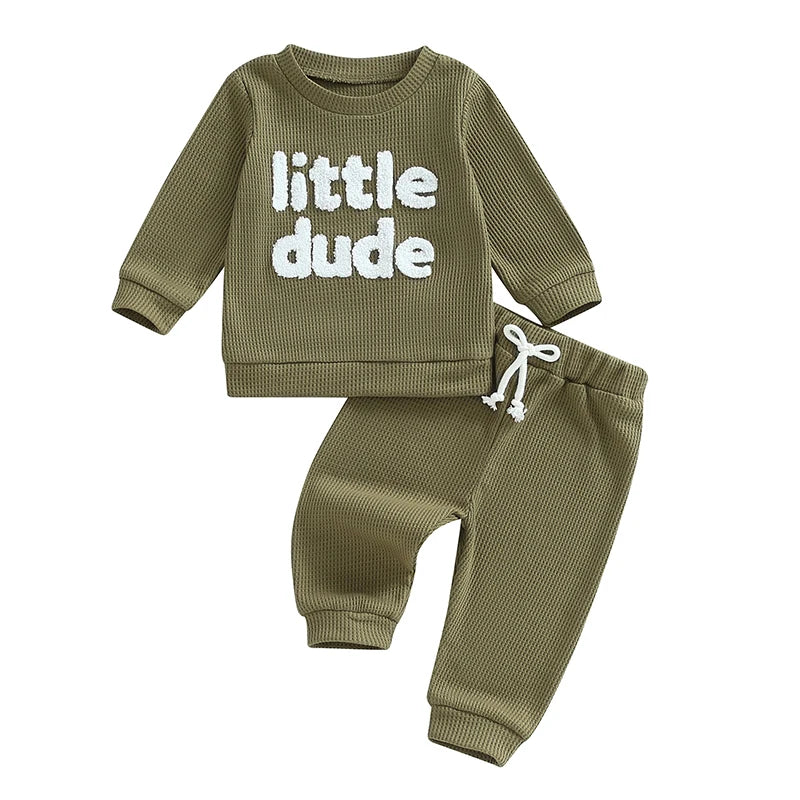 Baby boy outfit set with beige waffle long sleeve top with letter embroidery and solid elastic waist pants, by August + Willow.