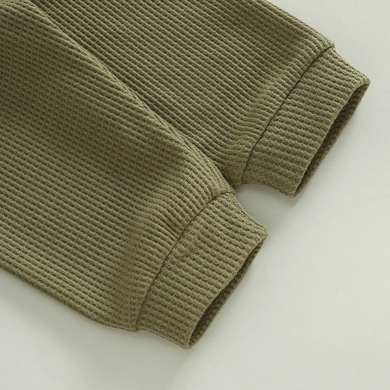 Baby toddler boys beige 2-piece waffle outfit with letter embroidery, long sleeve top and elastic waist solid pants by August + Willow.