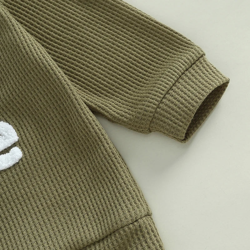 Baby toddler boys beige 2-piece waffle outfit with letter embroidery, long sleeve top, elastic waist pants by August + Willow.
