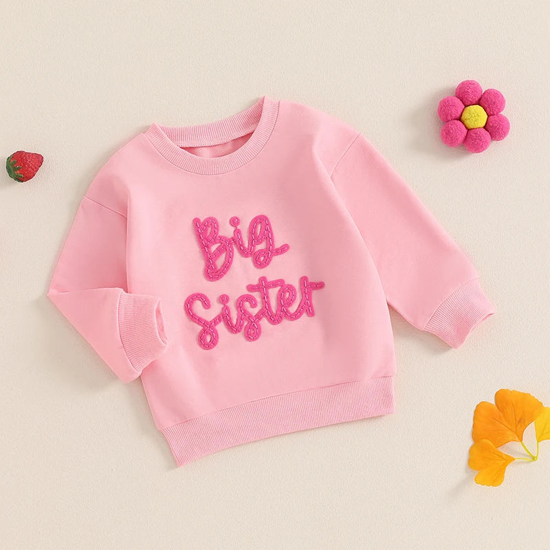 Beige toddler girls' long sleeve crewneck pullover with letter embroidery, loose fit, from August + Willow baby and toddler outfits.