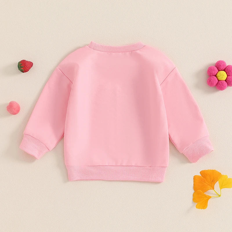 Toddler girls' beige long sleeve crewneck pullover top with letter embroidery, loose fit, from August + Willow baby and toddler outfits.