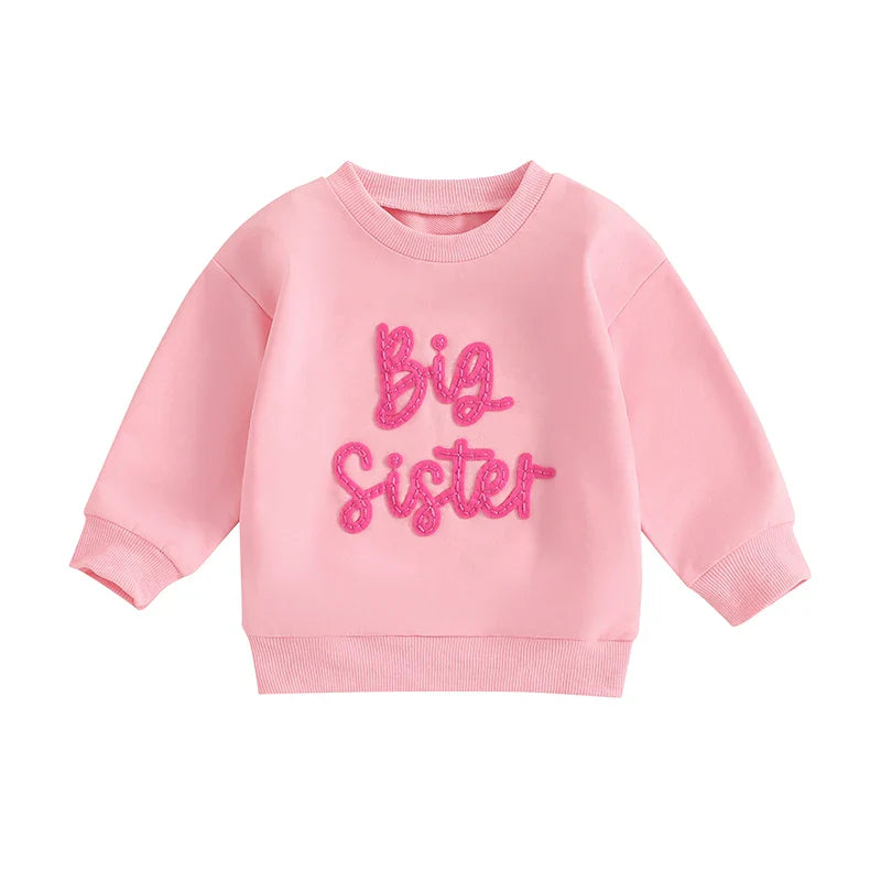 Toddler girls' beige long sleeve crewneck pullover with letter embroidery, loose fit, from August + Willow baby and toddler outfit collection.