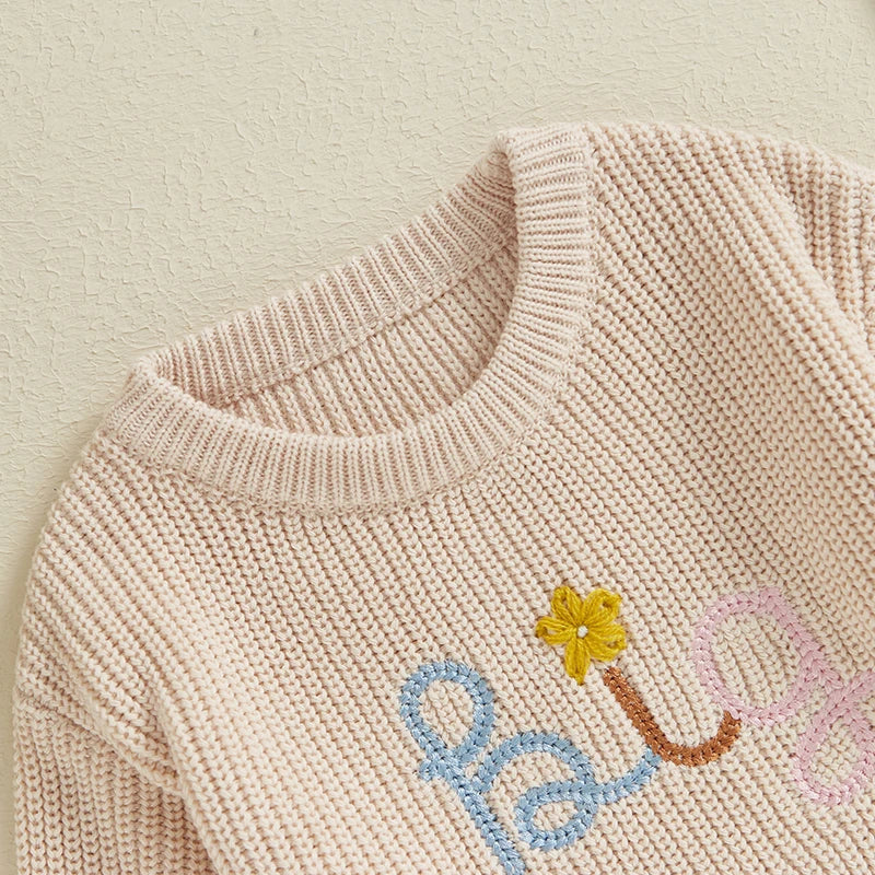 Baby girl fall winter sweater by August + Willow featuring embroidered flowers and letters, long sleeve crew neck pullover for toddlers.