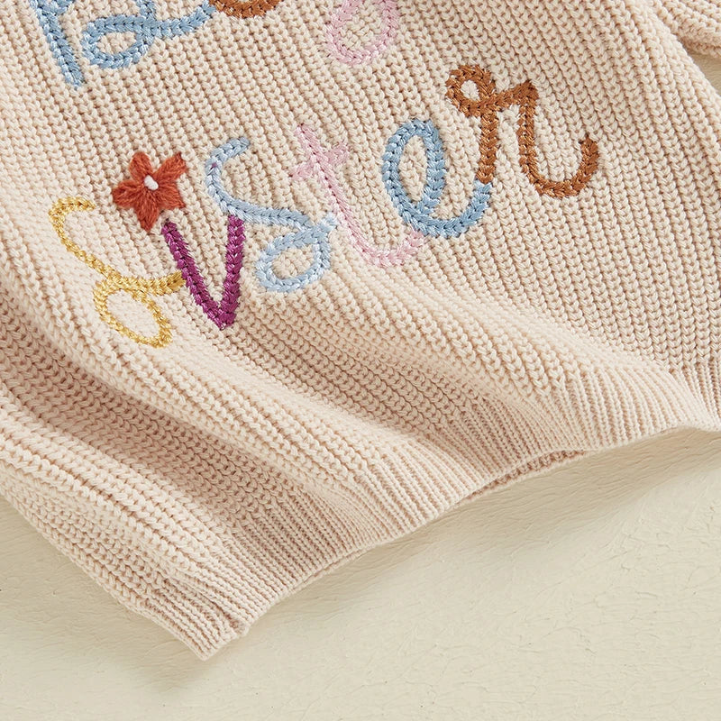 Baby girl fall winter sweater by August + Willow with letter and flower embroidery, crew neck, long sleeves, casual style for toddlers.