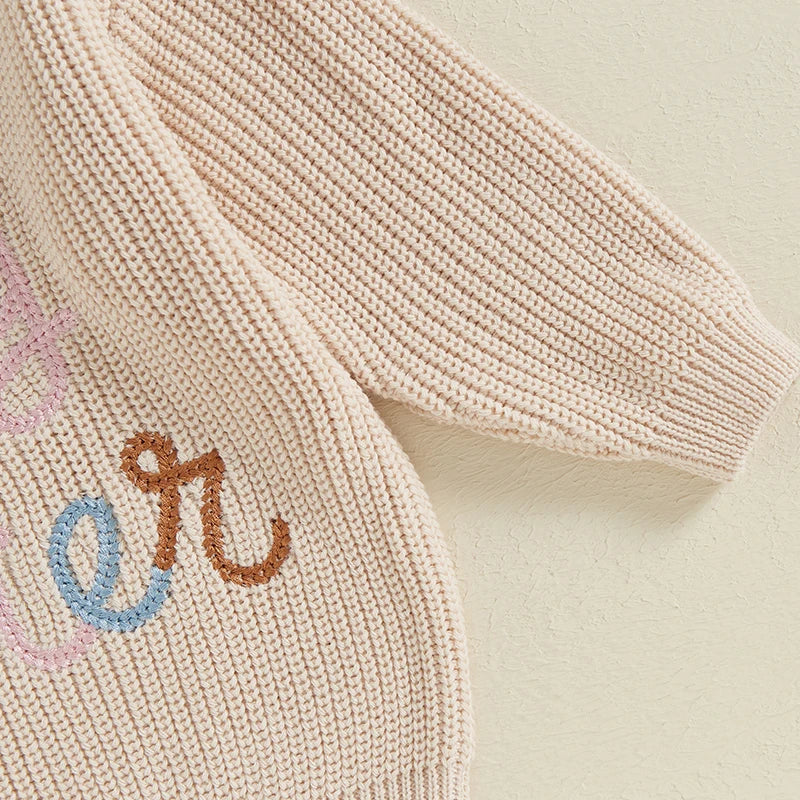 Baby girl toddler sweater by August + Willow featuring floral embroidery, letter details, crew neck, long sleeves, perfect for fall winter.