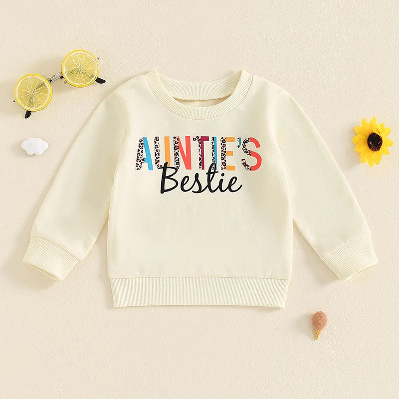 Baby girl toddler long sleeve crew neck pullover top by August + Willow with casual letter print in beige for ages 6-12 months.