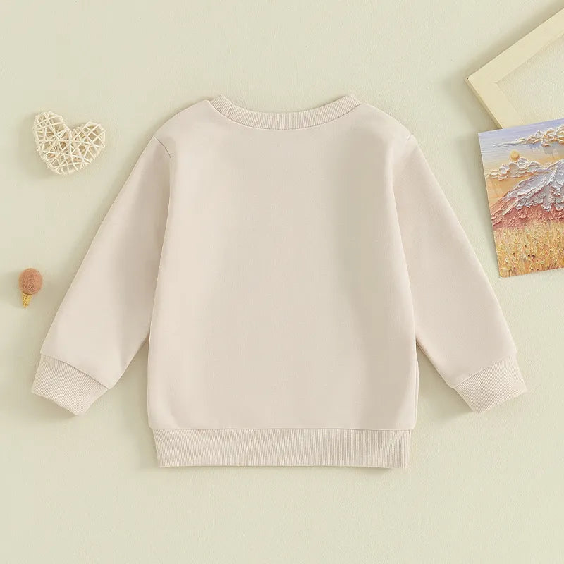 Baby and toddler boys and girls matching beige letter print long sleeve crewneck top by August + Willow.