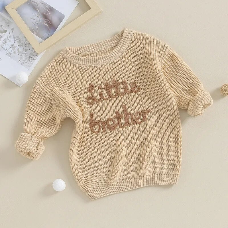 Beige baby boys sweater with letter embroidery and crew neck, long sleeves, from August + Willow baby and toddler outfits.