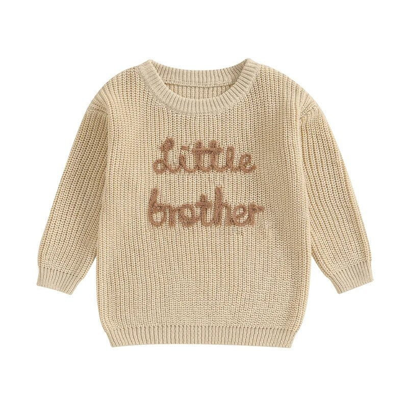 Beige baby boys sweater by August + Willow with letter embroidery, crew neck, long sleeves, and a cozy pullover style.