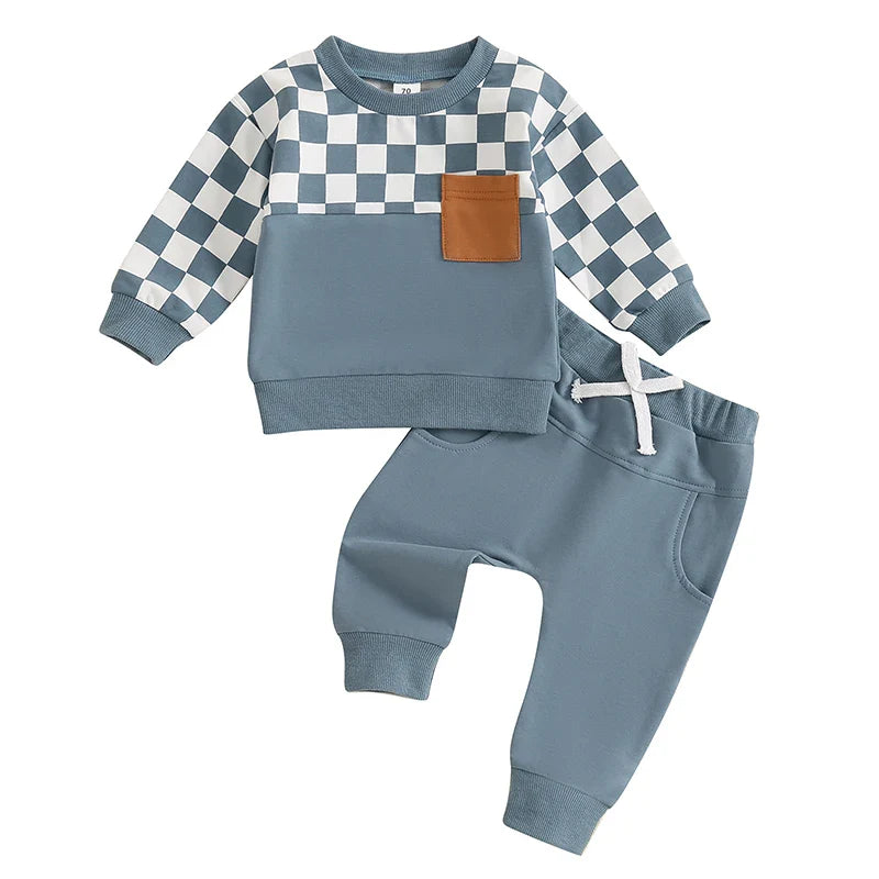 Baby toddler boys fall outfit set with a black checkerboard print long sleeve top and solid color long pants by August + Willow.