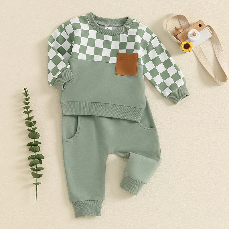Baby toddler boys fall outfit set with black checkerboard long sleeve top and solid color long pants by August + Willow.