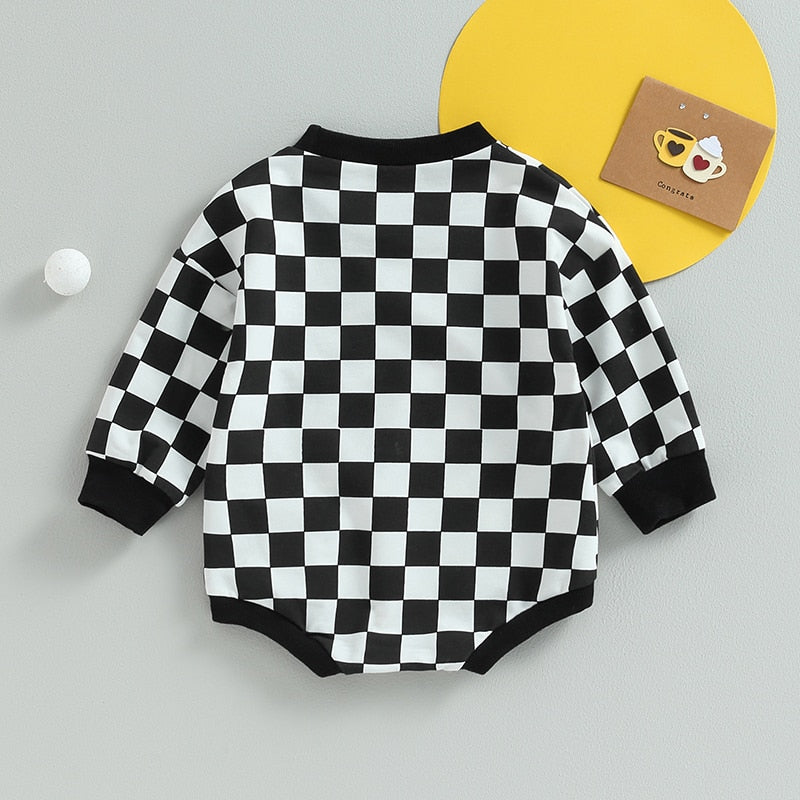Baby boy or girl fall sweatshirt bodysuit jumpsuit with checkerboard print, long sleeves, from August + Willow, suitable for toddlers.