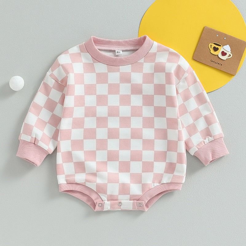 Baby boy or girl fall sweatshirt bodysuit with checkerboard print, long sleeves, from August + Willow, for toddlers.