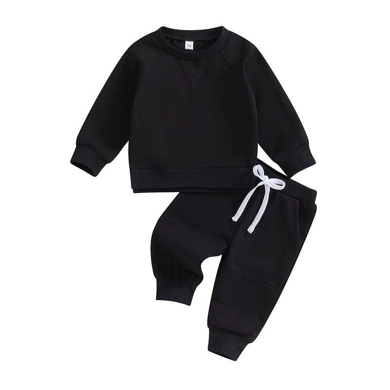 Baby toddler fall outfits set with long sleeve split hem tops and solid color pocket pants from August + Willow.
