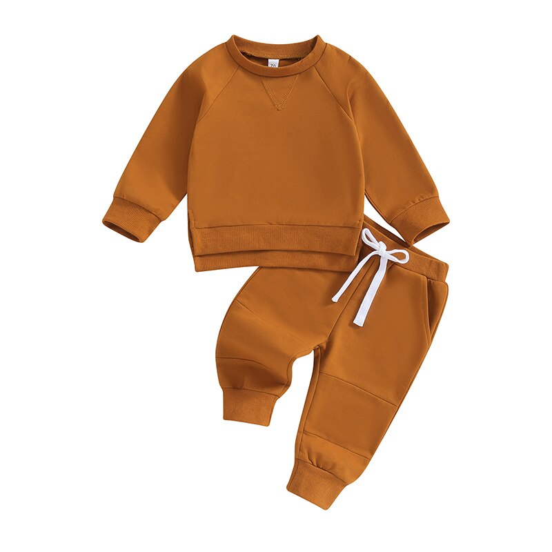 Black toddler baby boys and girls 2-piece fall outfit with long sleeve split hem tops and pocket pants by August + Willow.