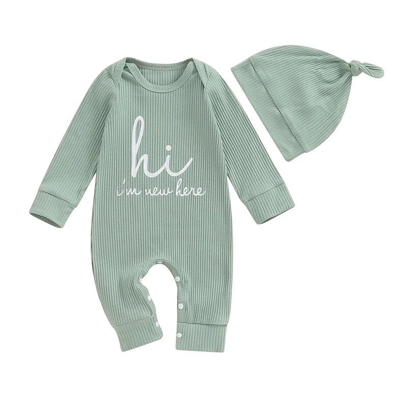 Baby boys and girls 2-piece romper set with letter print long sleeve jumpsuit and matching hat, from August + Willow for ages 6-12 months.